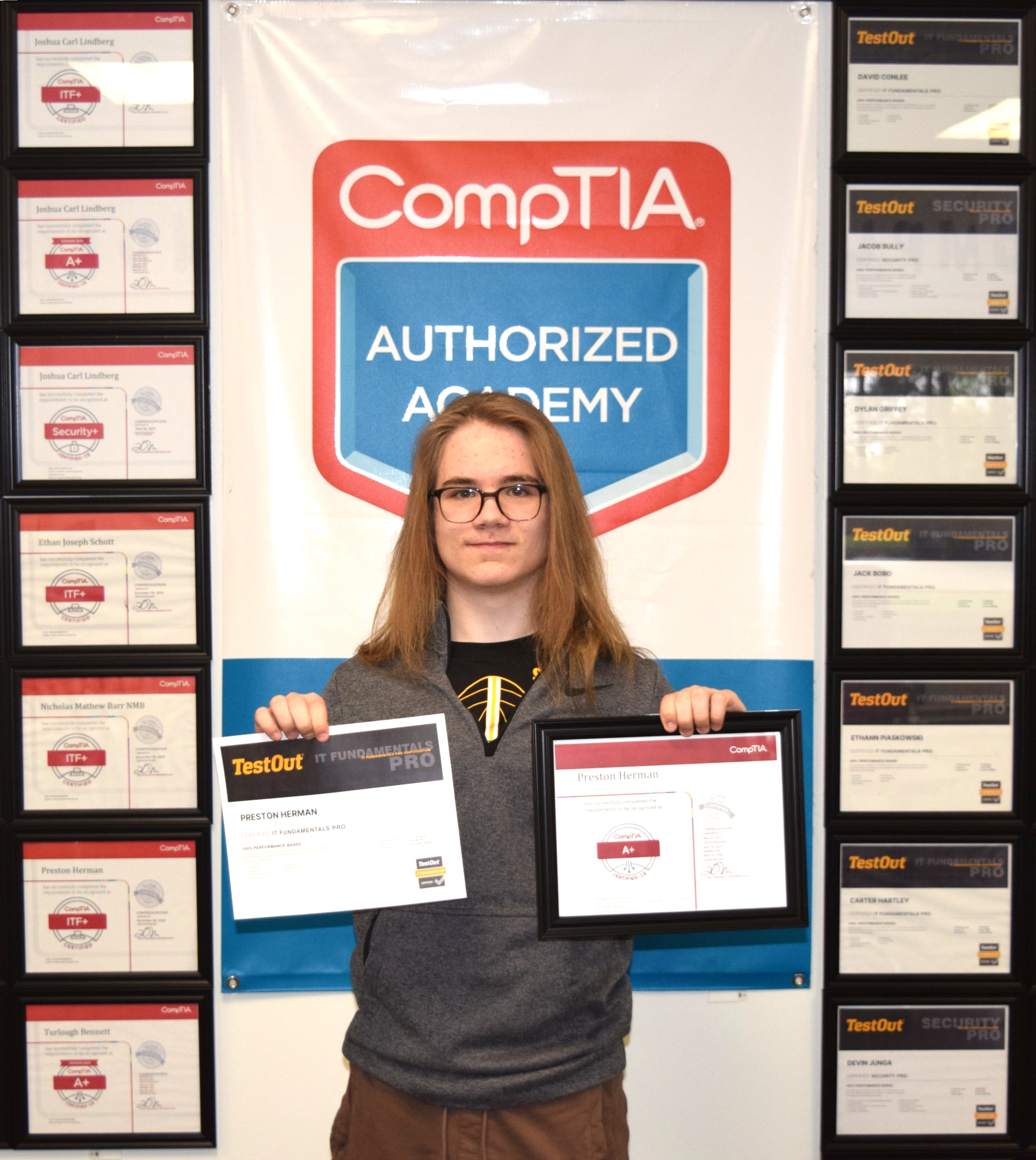 Cros-Lex student holding two certifications
